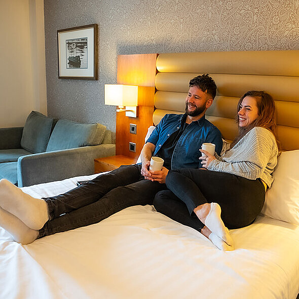 Couple relaxing in the hotel