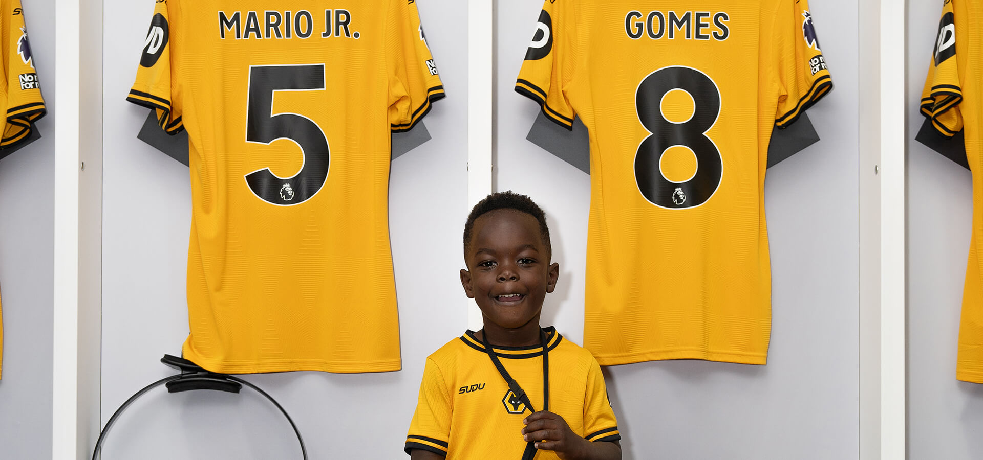 Child sat in Woves changing room